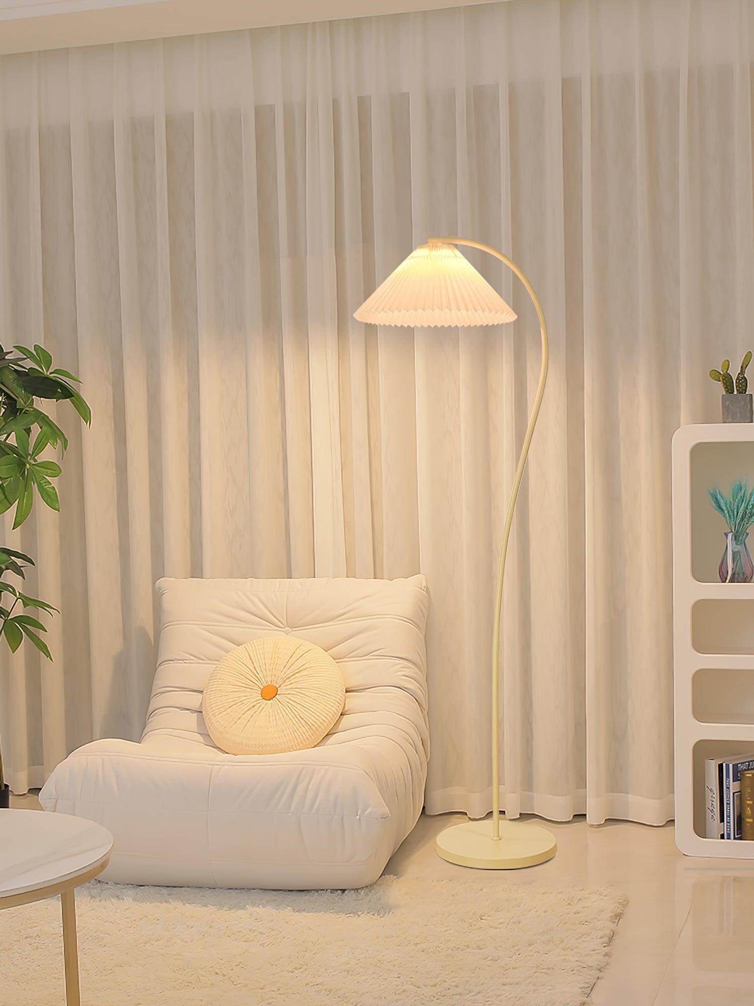 Pleated floor lamp with beech wood frame in a calm interior
