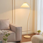 Side profile of the pleated linen shade on the floor lamp