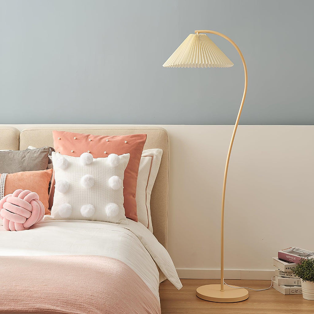 Pleated floor lamp lighting a softly styled living space
