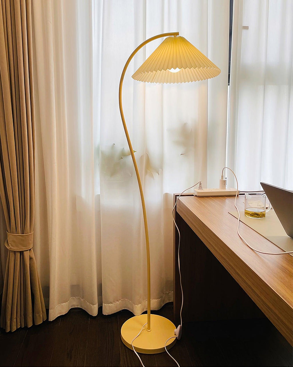 Pleated linen shade of the floor lamp seen from below