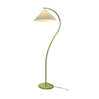 Pleated linen shade detail on the floor lamp at close range