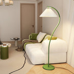 Pleated linen floor lamp in a warm, styled living room