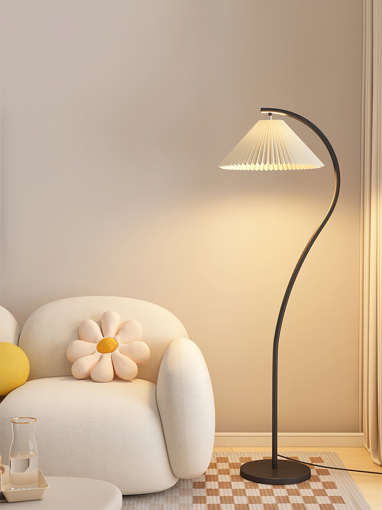 Pleated linen floor lamp lit in a calm neutral room