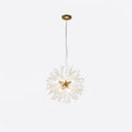 Another product shot of this Clérachic chandelier in a gold finish, a compact size against a white backdrop.