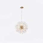A further product shot of this Clérachic chandelier in a gold finish, framed against a white backdrop.