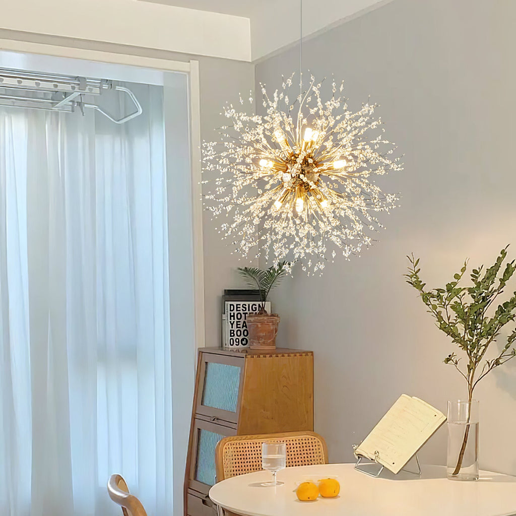 Warm light from this Clérachic chandelier's crystal-tipped branches spills over a sunlit room with sheer curtains and a small round table.