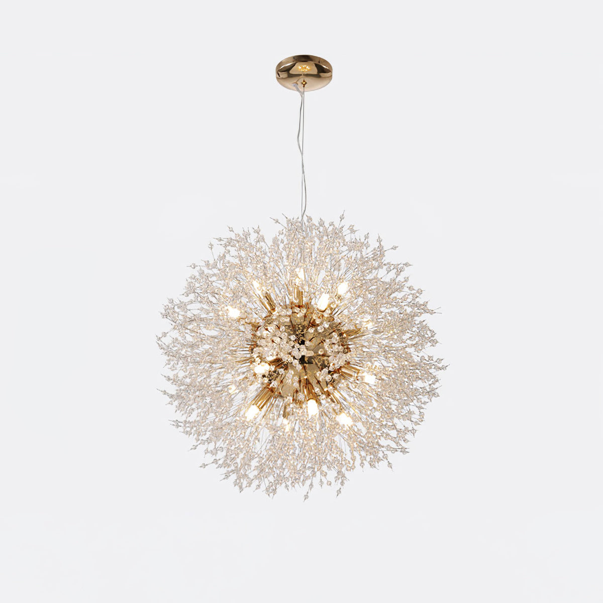 Product shot of this Clérachic chandelier in a gold finish, its cord and ceiling rose shown above the crystal-tipped sphere.