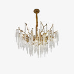 The round chandelier on pale grey, showing the full drop from ceiling rose to the lowest icicle.