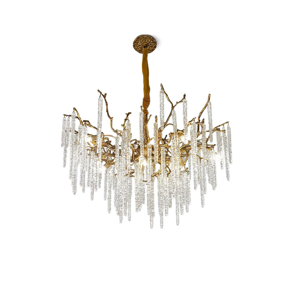 Round icicle chandelier on white, textured brass branches holding ribbed glass drops below a cast ceiling rose.