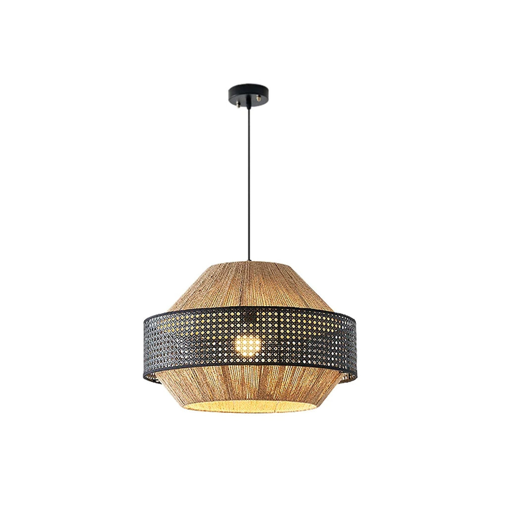 In black rattan, this Clérachic pendant sits unlit, its perforated woven band shown on a plain backdrop.