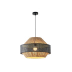 In black rattan, this Clérachic pendant sits unlit, its perforated woven band shown on a plain backdrop.