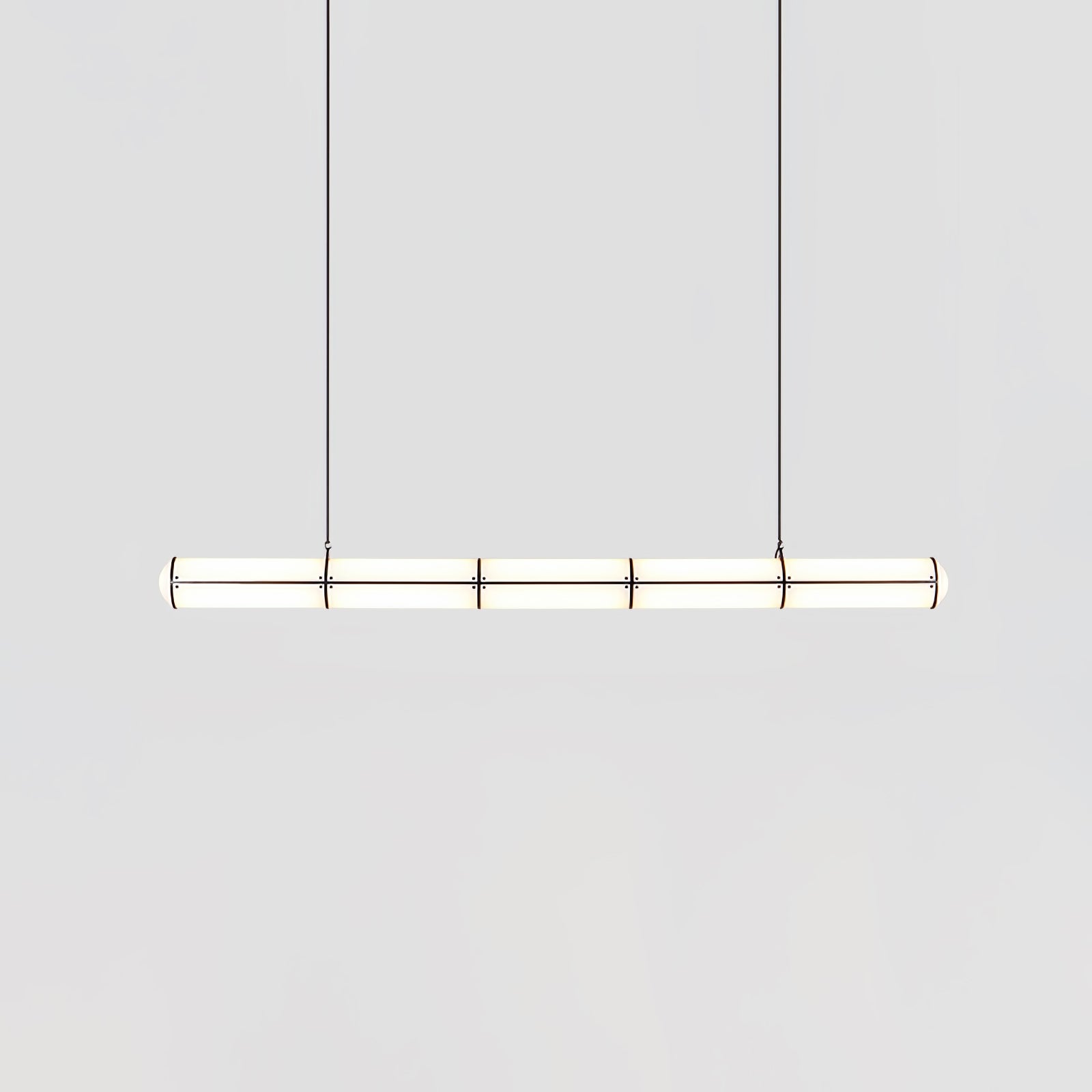 Linear pendant light shown in an architectural interior setting