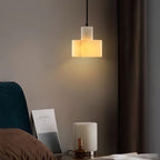 Alabaster pendant light shown in profile, shade shape visible