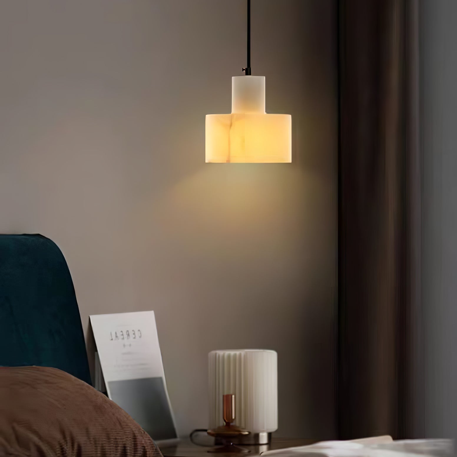 Alabaster pendant light shown in profile, shade shape visible