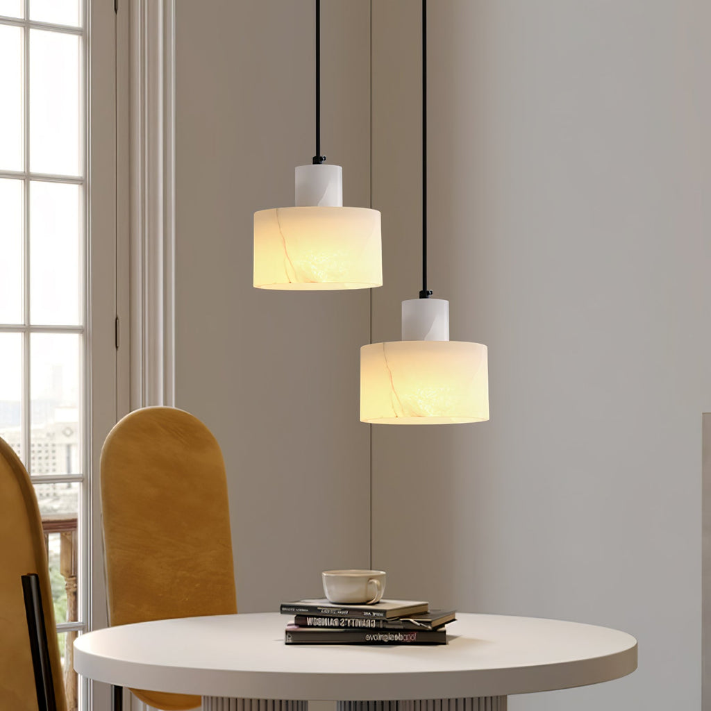Alabaster pendant light glowing softly as an accent light