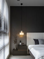 Alabaster pendant light suspended from an adjustable cable