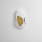 Translucent glass wall lamp adding ambient warmth to a lounge