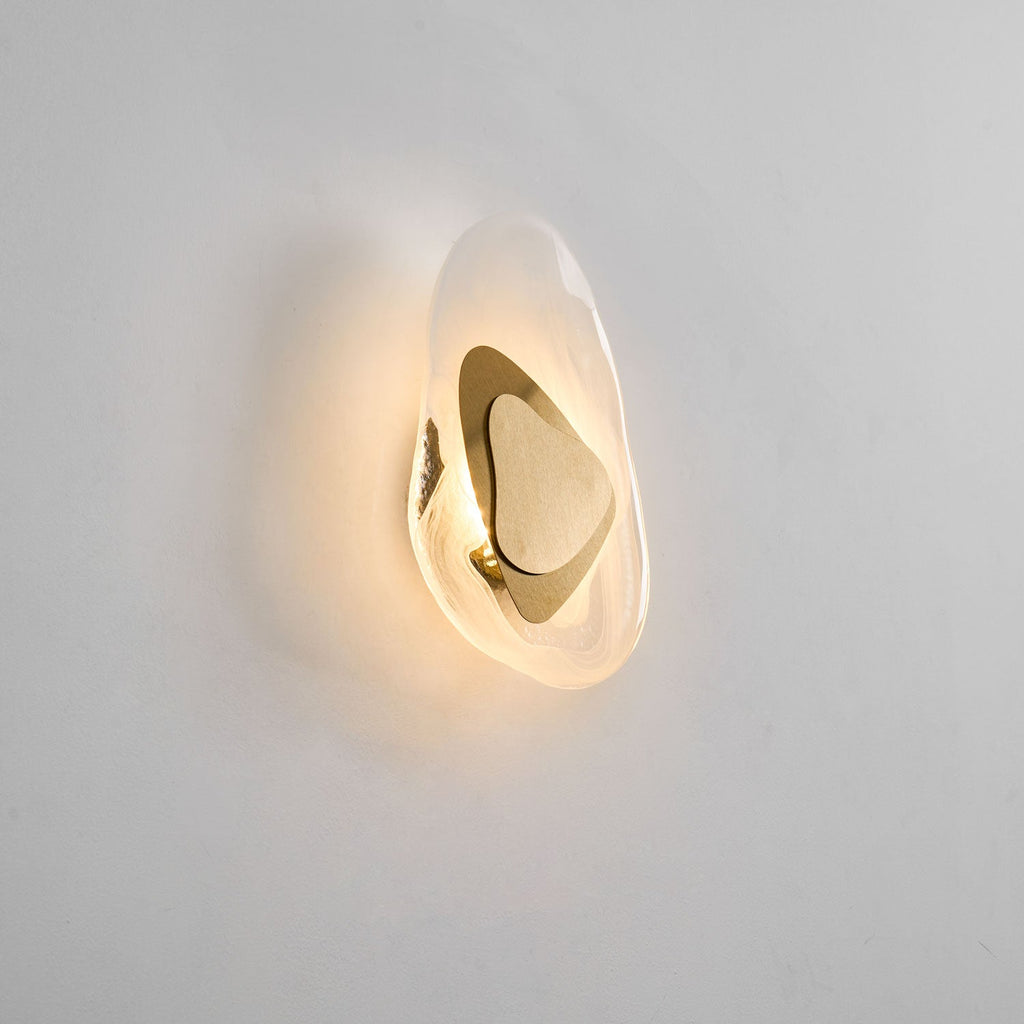 Translucent glass wall lamp detail with soft diffused light