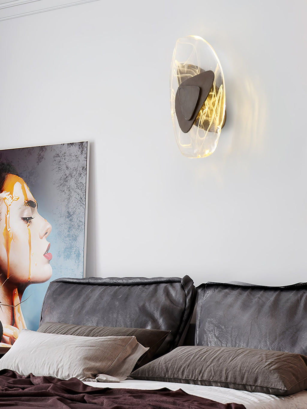 Wall lamp with glowing shade adding warmth to a dining corner