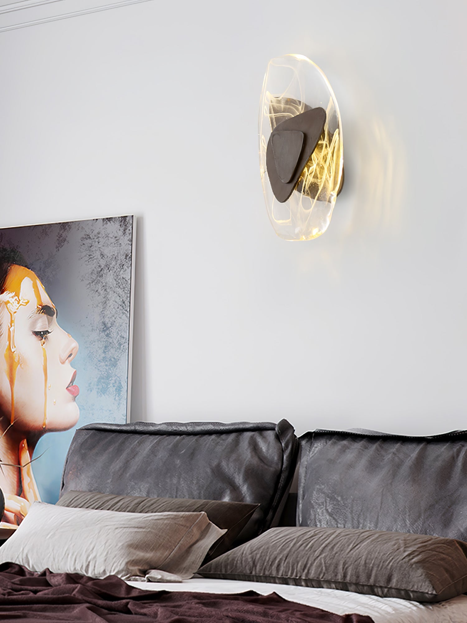 Wall lamp with glowing shade adding warmth to a dining corner