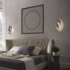 Translucent glass wall lamp casting depth and shadow on the wall