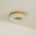 Slim flush mount ceiling light mounted close to the ceiling