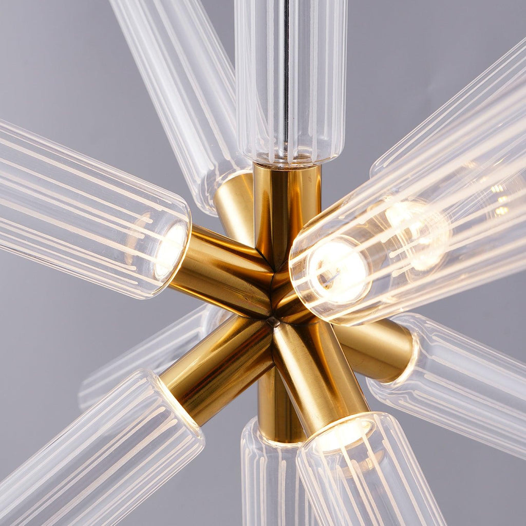 Close view of the lit bulbs where this Clérachic pendant's crystal rods meet at the centre.