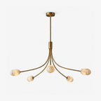 Studio view of this Clérachic chandelier in brushed brass, its five alabaster discs angled outward from a central rod.