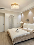 Glass petal chandelier glimmering as a statement ceiling piece