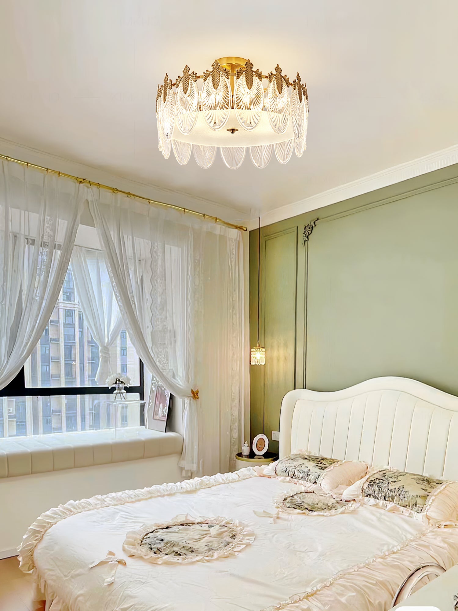 Glass petal chandelier suspended in a high-ceilinged room