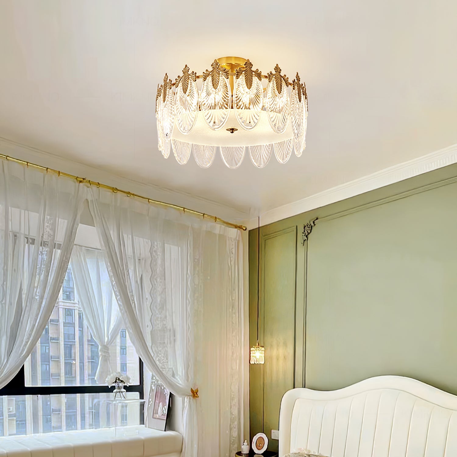 Warm glow refracting through the textured glass petals of the chandelier