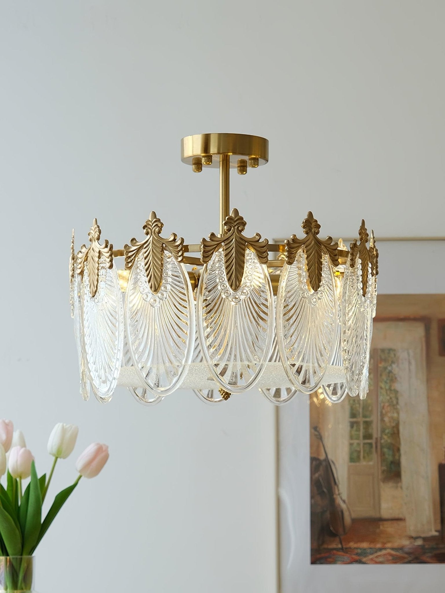 Glass petal chandelier suspended over an entryway
