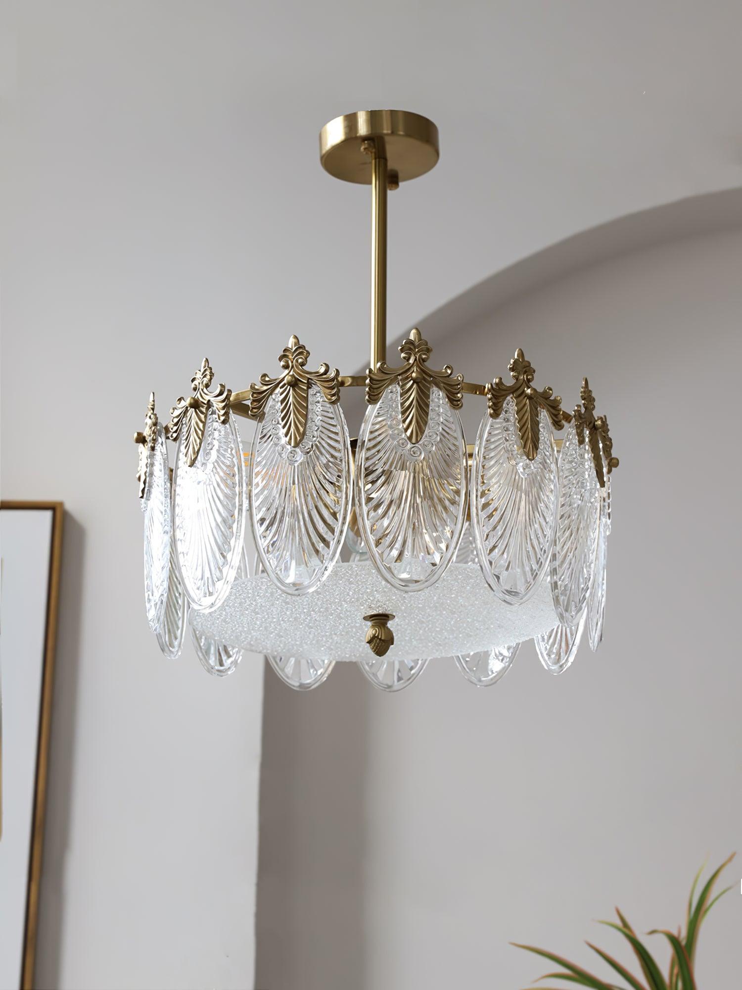 Glass petal chandelier glowing in a refined living space