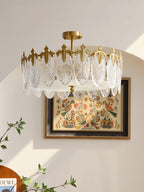 Glass petal chandelier glowing softly as a centrepiece
