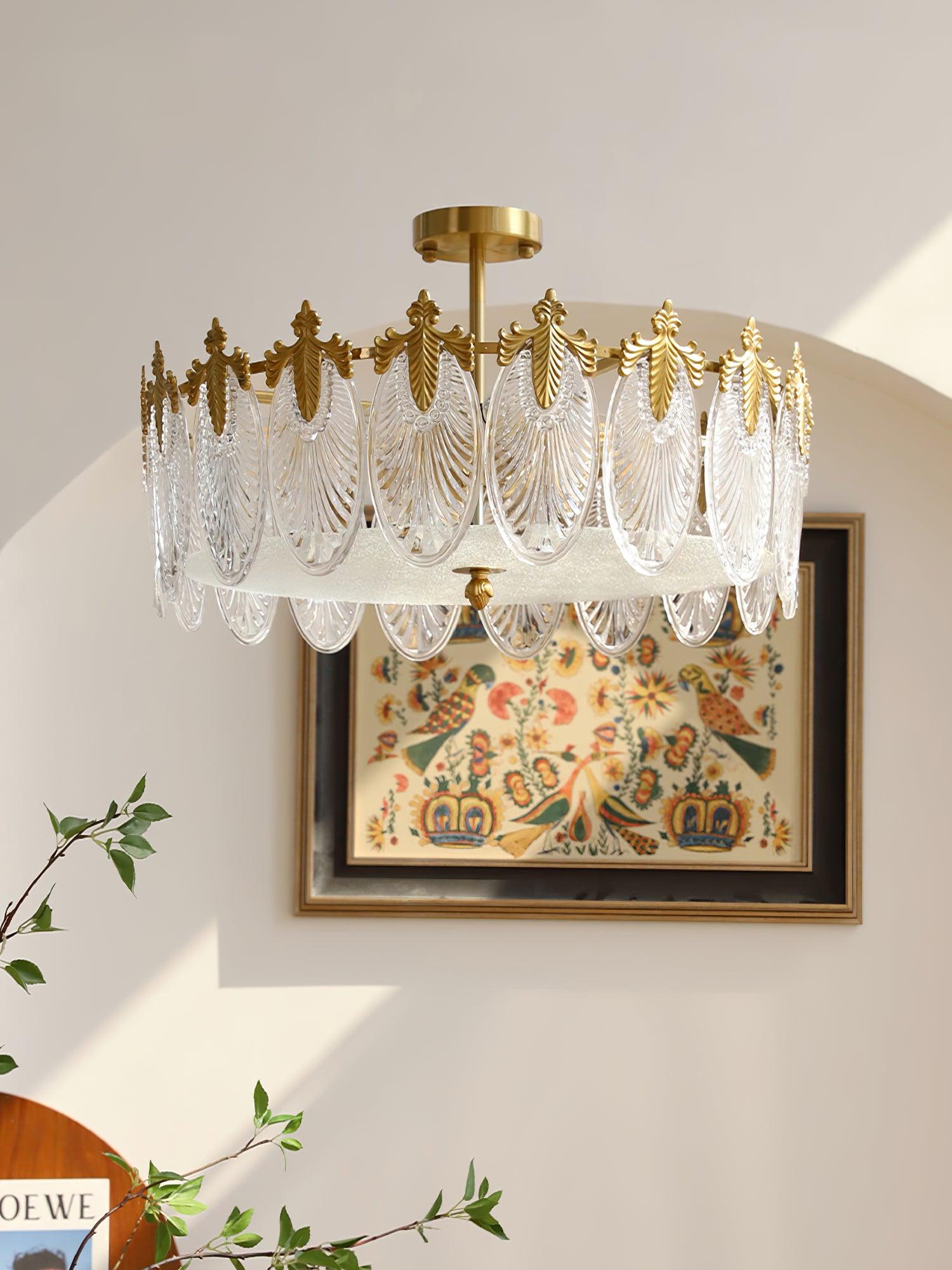 Glass petal chandelier glowing softly as a centrepiece