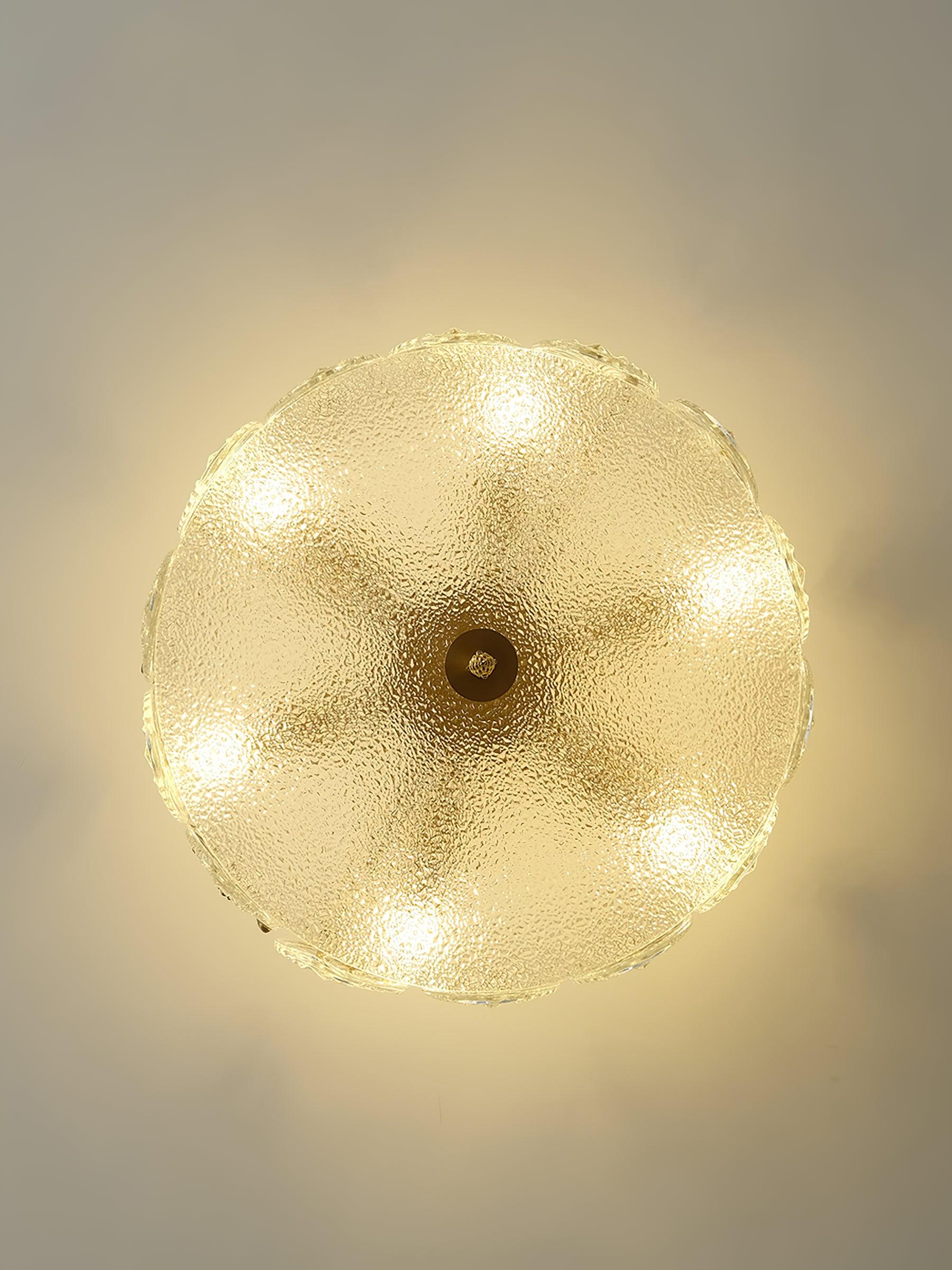 Glass petal chandelier shown unlit, sculptural petal form visible