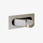 LED bedside reading light shown in matt black on a bedroom wall