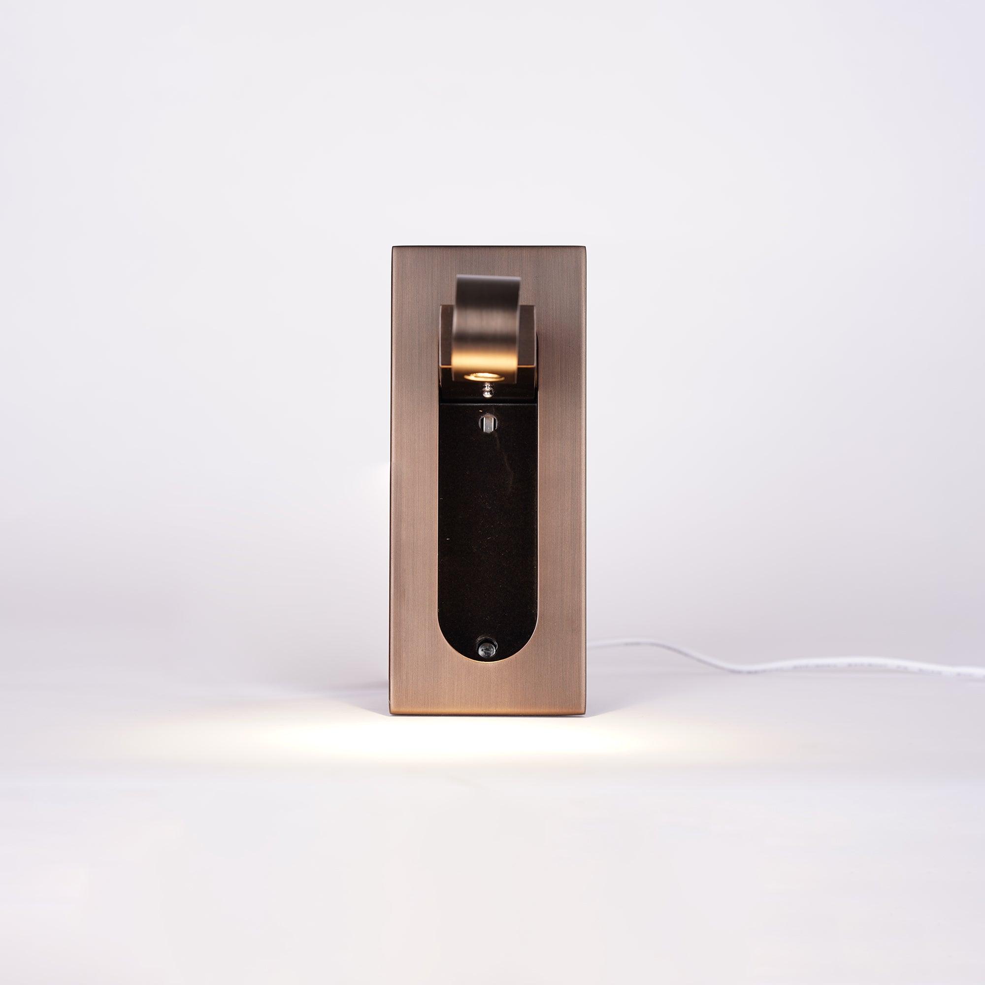 LED bedside reading light detail showing the hidden switch action