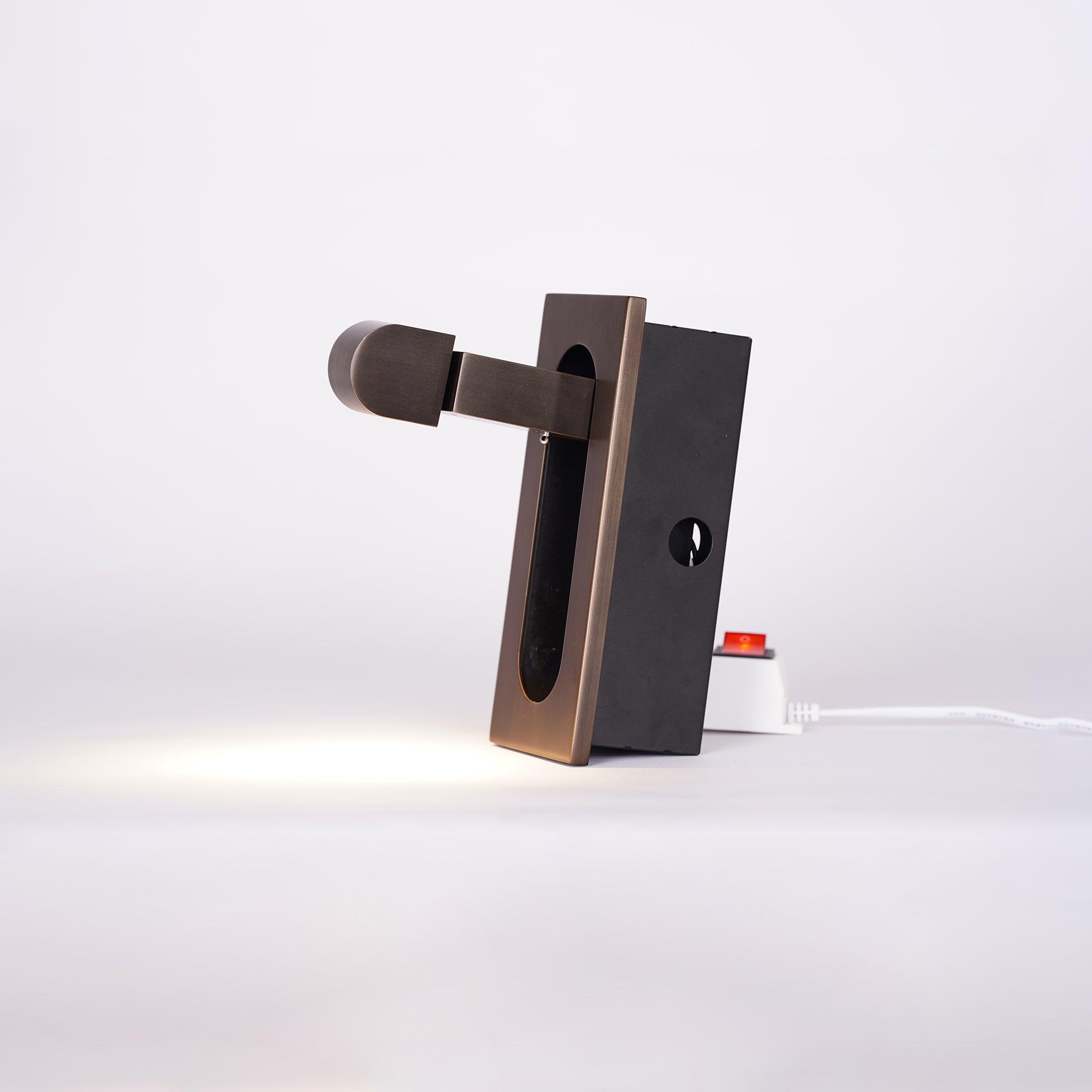 LED bedside reading light detail of the pivoting head and base