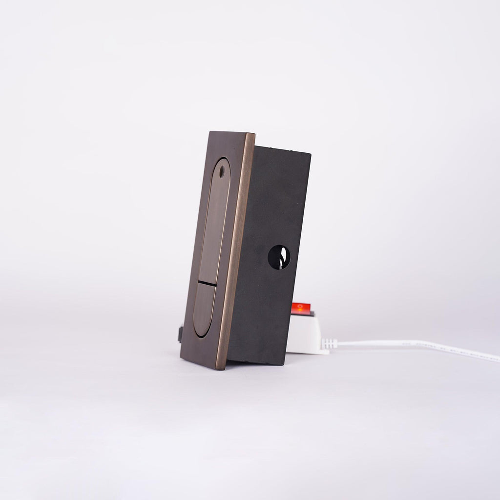 LED bedside reading light shown extended from the wall plate