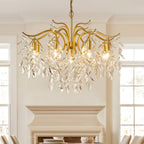 The chandelier lit in a cream room above a painted fireplace, tall windows on either side.