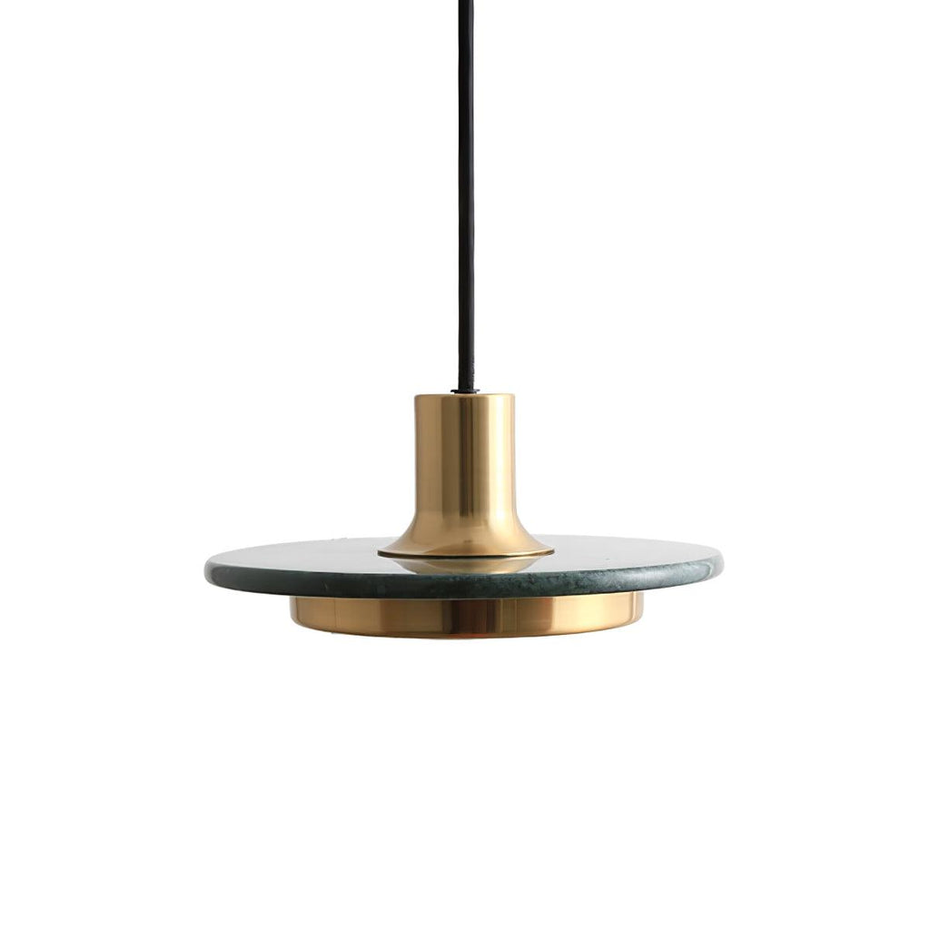 A green-veined stone disc pendant with a gold rim, angled close against white to show the Clérachic fixture's brass cap and cord.
