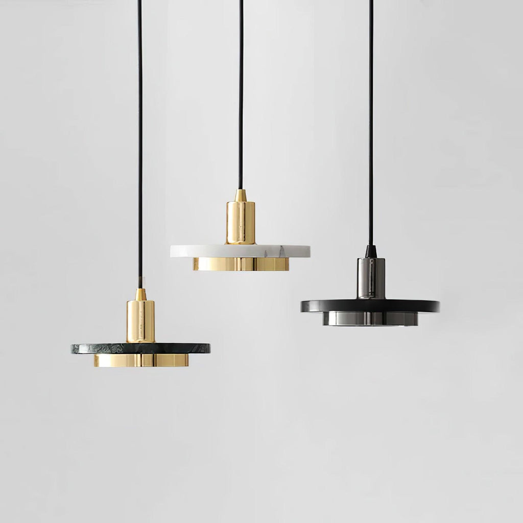 Three Clérachic pendant lights shown in different finish combinations, arranged side by side on white.