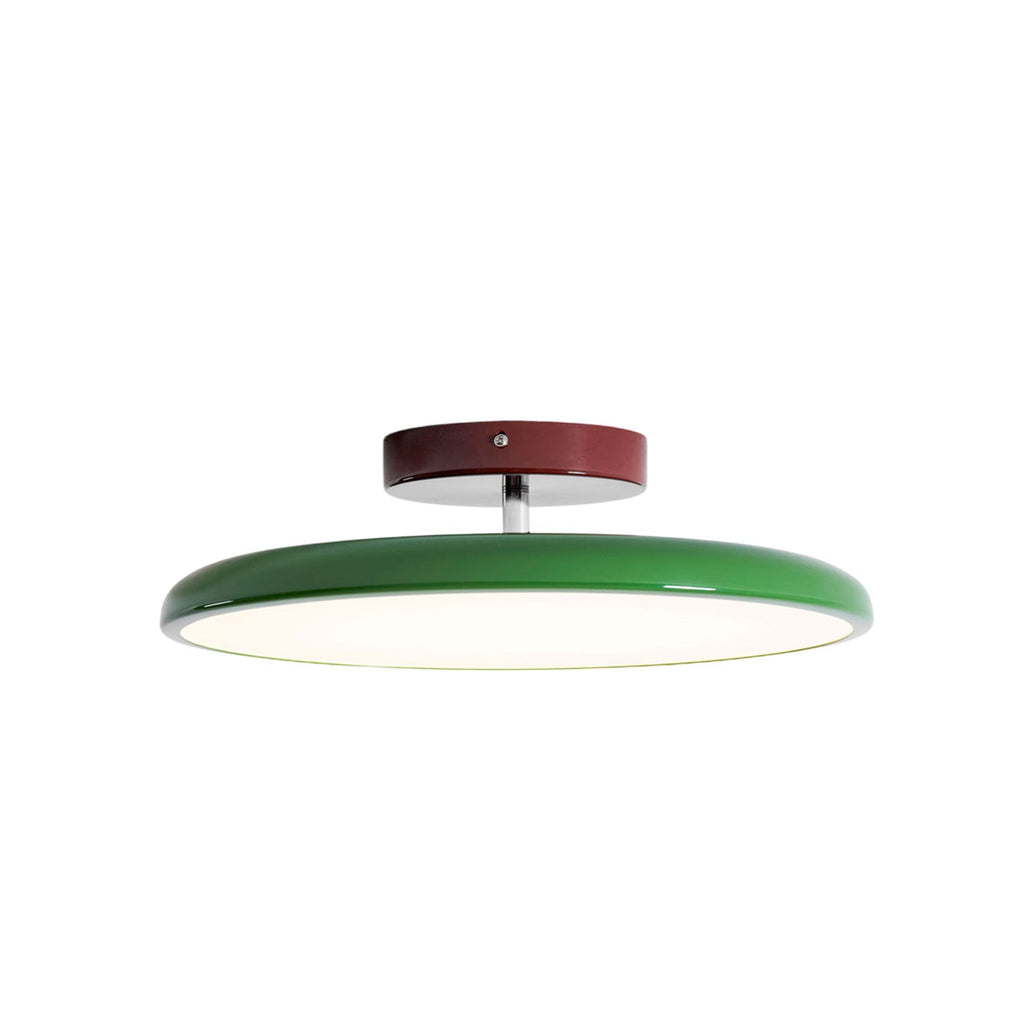 Swing-arm ceiling lamp with acrylic shade in a styled interior