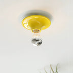 Eclipta wall sconce detail showing the join between base and bulb