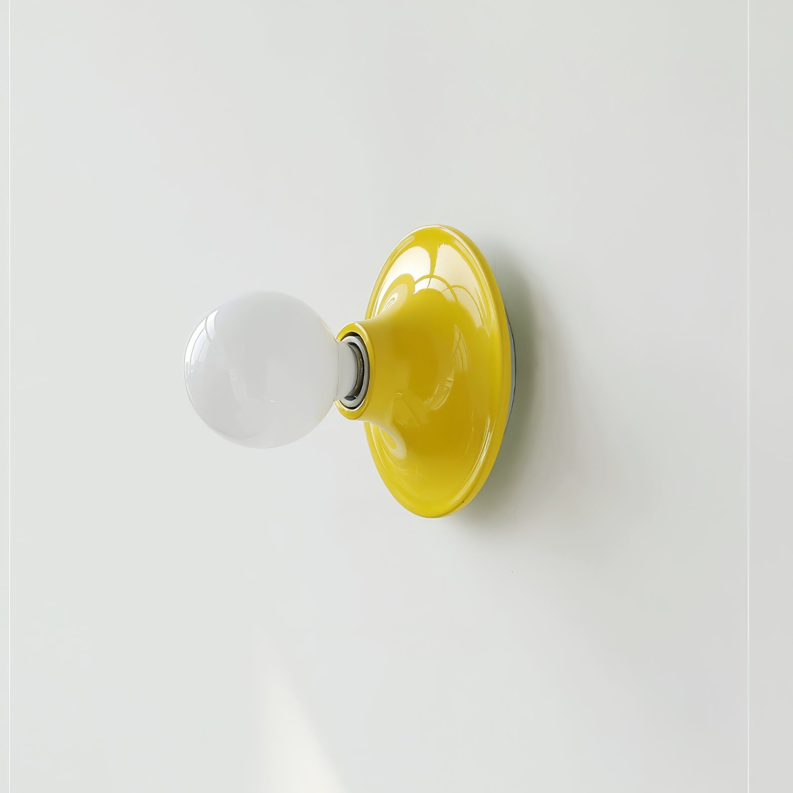 Eclipta wall sconce lighting a creative studio corner