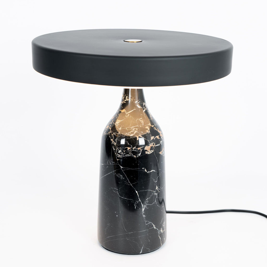 Black marble Clérachic table lamp, disc shade held level, medium studio crop with its cord visible on white.