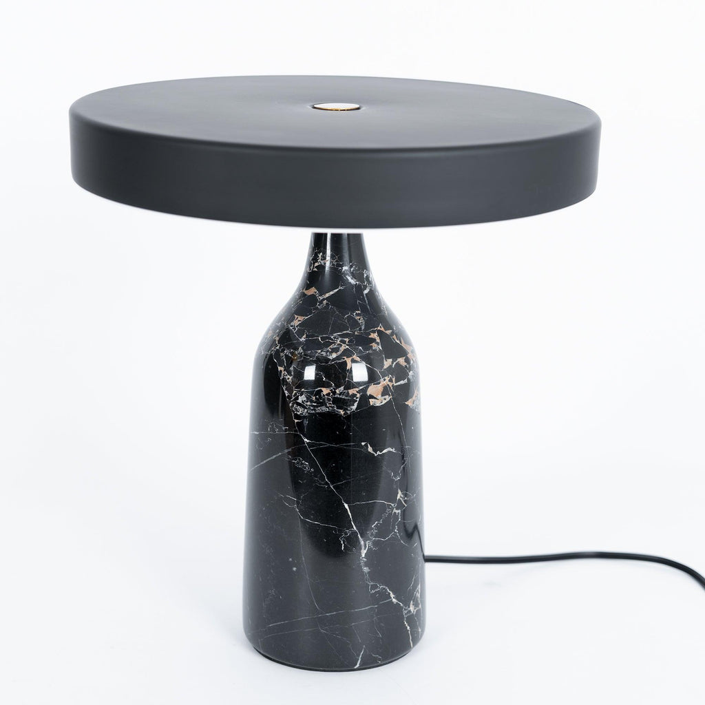 Black marble Clérachic table lamp, disc shade held level, a slightly wider studio crop with its cord visible.