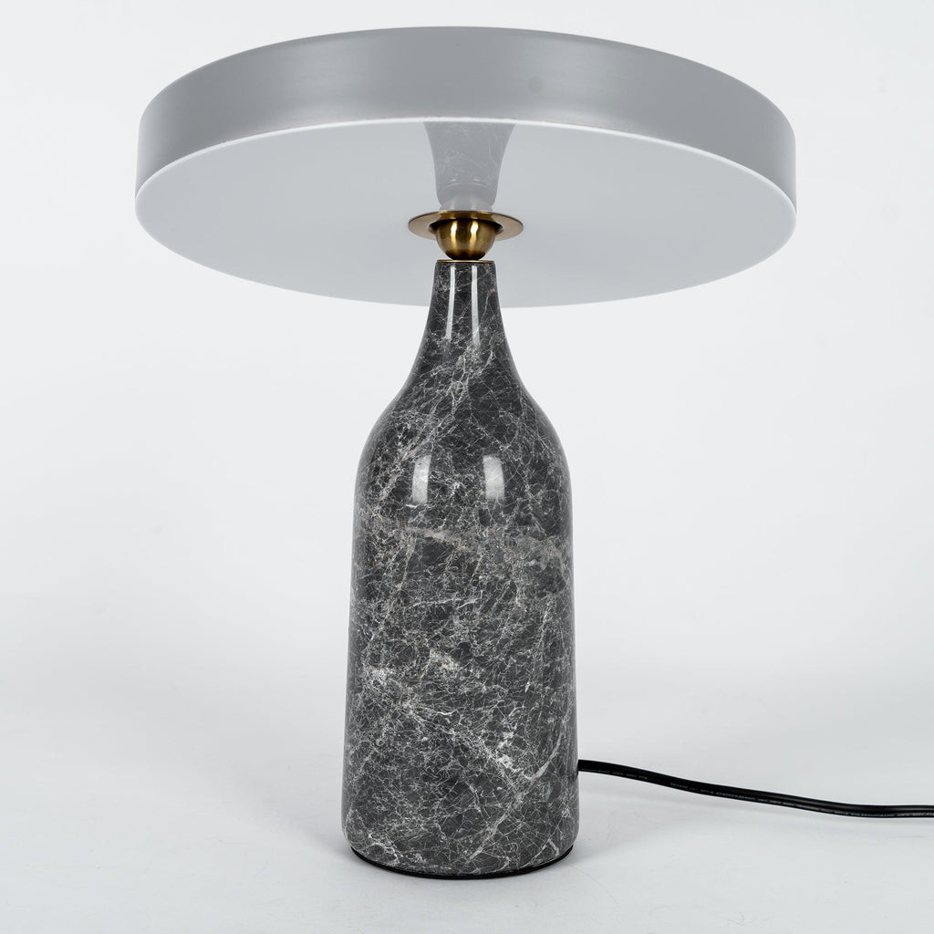 Grey marble Clérachic table lamp with its disc shade angled nearly edge-on, shown on a plain white background.