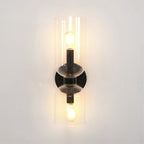 Centred on a white wall, this matt black Clérachic wall light's clear shades glow warmly.